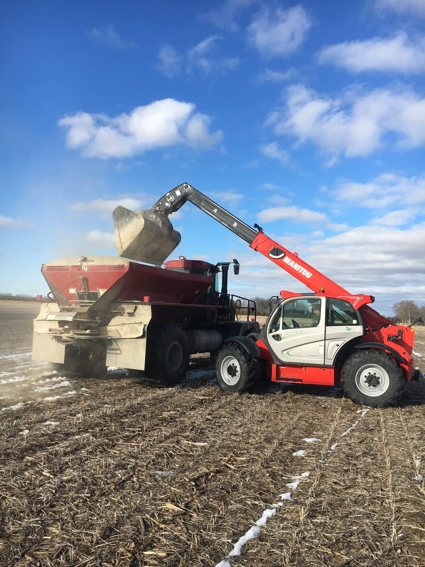 N-Rich fertilizer loading operation against blue sky